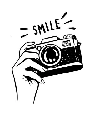 Ilustračný obrázok fotoaparátu s nápisom SMILE.